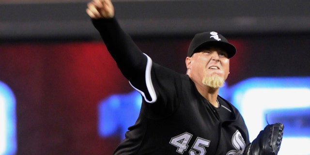 FILE - In this July 15, 2010, file photo, Chicago White Sox pitcher Bobby Jenks throws against the Minnesota Twins during a baseball game in Minneapolis.