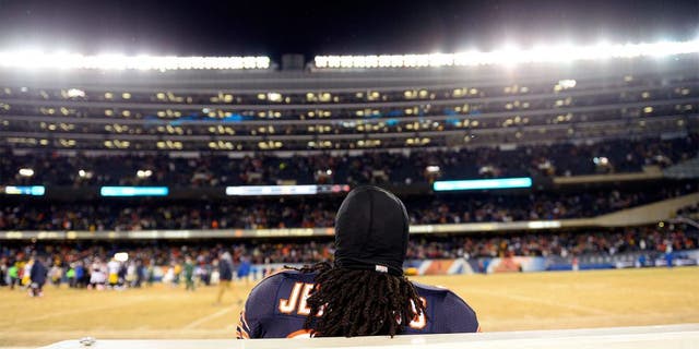 Dec 29, 2013; Chicago, IL, USA; Chicago Bears cornerback Tim Jennings (26) sits on the bench after the game against the Green Bay Packers at Soldier Field. The Green Bay Packers win 33-28. Mandatory Credit: Mike DiNovo-USA TODAY Sports