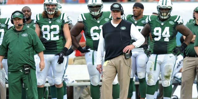 Dec 29, 2013; Miami Gardens, FL, USA; New York Jets head coach Rex Ryan looks on from the sideline during the first half against the Miami Dolphins at Sun Life Stadium. Mandatory Credit: Steve Mitchell-USA TODAY Sports