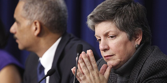 Dec. 14: Attorney General Eric Holder,, left, and Homeland Security Secretary Janet Napolitano attend a forum on intellectual property theft at the Eisenhower Executive Office Building across from the White House in Washington.