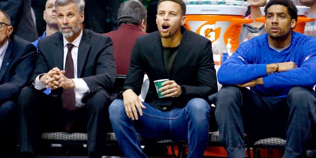 DALLAS, TX - DECEMBER 30: Stephen Curry #30 of the Golden State Warriors yells while on the bench during a game against the Dallas Mavericks at American Airlines Center on December 30, 2015 in Dallas, Texas. NOTE TO USER: User expressly acknowledges and agrees that, by downloading and or using photograph, User is consenting to the terms and conditions of the Getty Images License Agreement. (Photo by Ronald Martinez/Getty Images)
