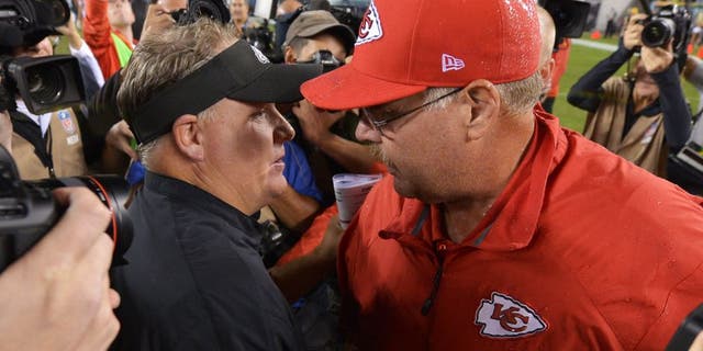 PHILADELPHIA, PA - SEPTEMBER 19: Head coach Chip Kelly of the Philadelphia Eagles and head coach Andy Reid of the Kansas City Chiefs shake hands after the game at Lincoln Financial Field on September 19, 2013 in Philadelphia, Pennsylvania. The Chiefs won 26-16. (Photo by Drew Hallowell/Philadelphia Eagles/Getty Images)
