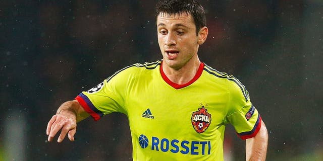 EINDHOVEN, NETHERLANDS - DECEMBER 08: Alan Dzagoev of CSKA in action during the group B UEFA Champions League match between PSV Eindhoven and CSKA Moscow held at Philips Stadium, on December 8, 2015 in Eindhoven, Netherlands. (Photo by Dean Mouhtaropoulos/Getty Images)