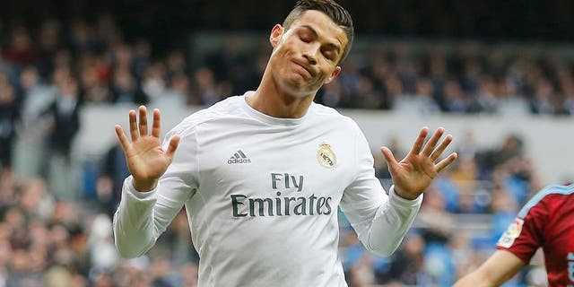 MADRID, SPAIN - DECEMBER 30: Cristiano Ronaldo of Real Madrid celebrates after scoring the opening goal during the La Liga match between Real Madrid CF and Real Sociedad at Estadio Santiago Bernabeu on December 30, 2015 in Madrid, Spain. (Photo by Angel Martinez/Real Madrid via Getty Images)