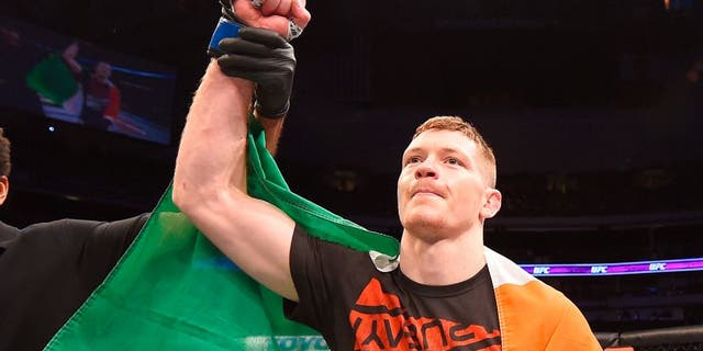 DALLAS, TX - MARCH 14: Joseph Duffy celebrates after defeating Jake Lindsey in their lightweight bout during the UFC 185 event at the American Airlines Center on March 14, 2015 in Dallas, Texas. (Photo by Josh Hedges/Zuffa LLC/Zuffa LLC via Getty Images)