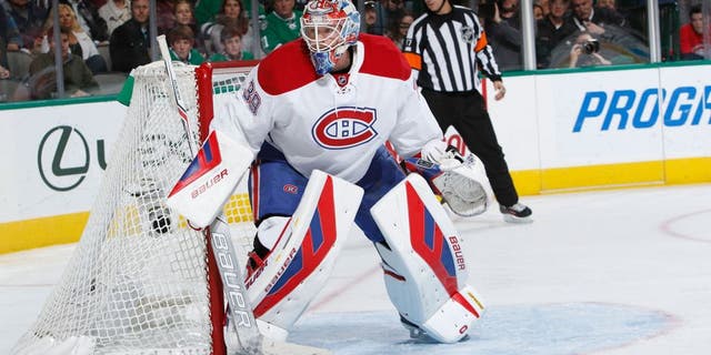 DALLAS, TX - DECEMBER 19: Mike Condon #39 of the Montreal Canadiens waits for the puck against the Dallas Stars at the American Airlines Center on December 19, 2015 in Dallas, Texas. (Photo by Glenn James/NHLI via Getty Images)
