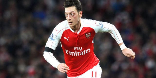 LONDON, ENGLAND - DECEMBER 28: Mesut Ozil of Arsenal during the Barclays Premier League match between Arsenal and A.F.C. Bournemouth at Emirates Stadium on December 28, 2015 in London, England. (Photo by Stuart MacFarlane/Arsenal FC via Getty Images)