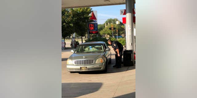 A now-viral Facebook post describes how a police officer helped out an elderly woman at a gas station last week.