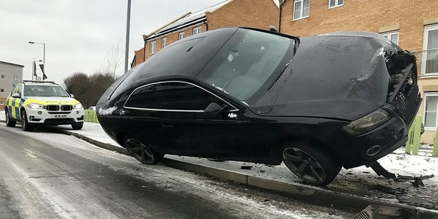 The car hit one bollard that launched it onto another.