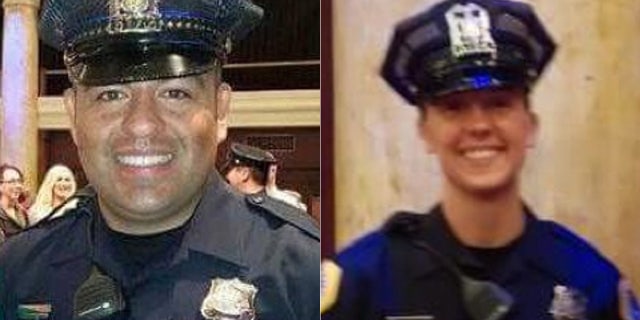 Des Moines officers Carlos Puente-Morales, left, and Susan Farrell.