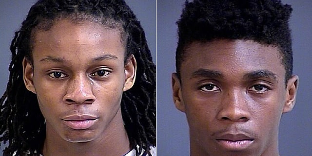 Deon Frasier, 17, left, and Michael Dupree-Taylor, 19