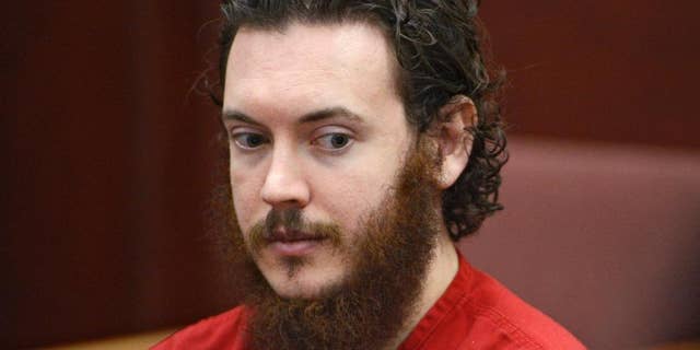FILE - This June 4, 2013 file photo shows Aurora theater shooting suspect James Holmes in court in Centennial, Colo. Judge Carlos Samour Jr. will hear arguments in a Monday, Feb. 9, 2015 hearing from defense attorneys that say a jailhouse video of Holmes should be barred from evidence during trial because prosecutors gave it to them too late. (AP Photo/The Denver Post, Andy Cross, Pool, File)