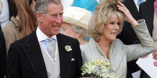 Britain's Prince Charles stands with Duchess of Cornwall, as Queen Elizabeth stands at rear after Service of Prayer and Dedication at St George's Chapel in Windsor Castle.