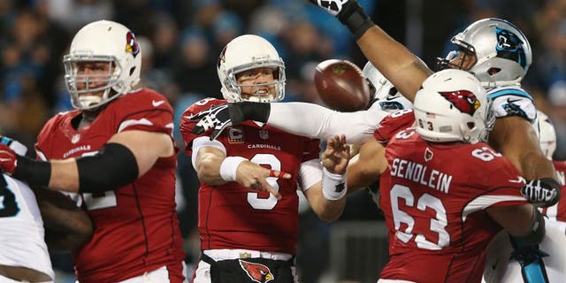 CHARLOTTE, NC - JANUARY 24: Carson Palmer #3 of the Arizona Cardinals throws an incomplete pass in the first half against the Carolina Panthers during the NFC Championship Game at Bank of America Stadium on January 24, 2016 in Charlotte, North Carolina. (Photo by Streeter Lecka/Getty Images)