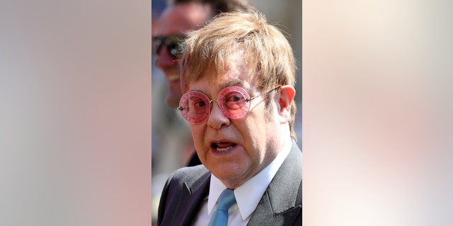 Elton John leaves St George's Chapel at Windsor Castle after the wedding of Meghan Markle and Prince Harry. Saturday May 19, 2018.