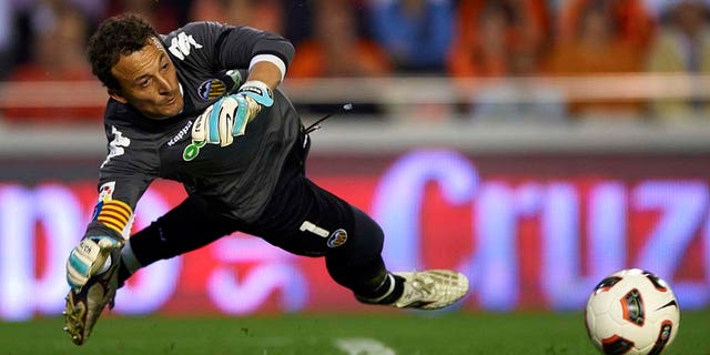 VALENCIA, SPAIN - APRIL 10: Cesar Sanchez Dominguez of Valencia kicks the ball during the La Liga match between Valencia and Villarreal at Estadio Mestalla on April 10, 2011 in Valencia, Spain. Valencia won 5-0. (Photo by Manuel Queimadelos Alonso/Getty Images)