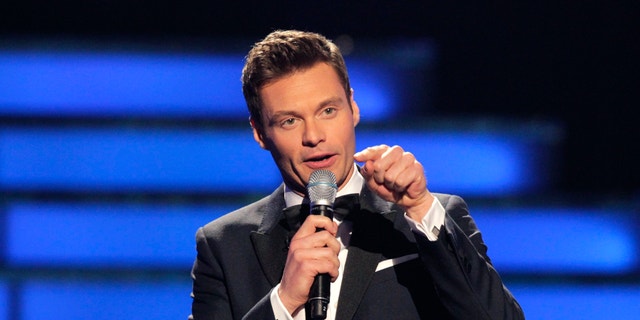 Host Ryan Seacrest presides over the 11th season finale of "American Idol" in Los Angeles, California, May 23, 2012.