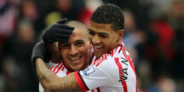SUNDERLAND, UNITED KINGDOM - FEBRUARY 13: Wahbi Khazri of Sunderland (L) celebrates the first goal with Patrick Van Aanholt during the Barclays Premier match between Sunderland and Manchester United at the Stadium of Light on February 13, 2016 in Sunderland, England. (Photo by Ian Horrocks - Sunderland AFC via Getty Images)