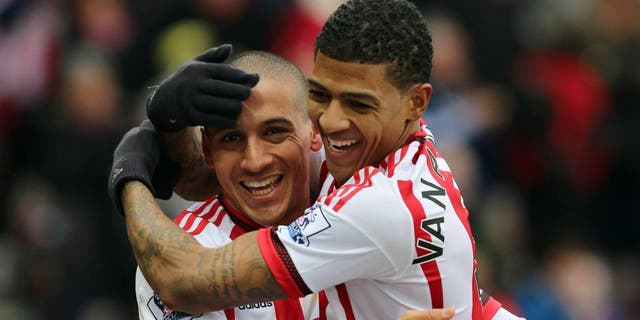 SUNDERLAND, UNITED KINGDOM - FEBRUARY 13: Wahbi Khazri of Sunderland (L) celebrates the first goal with Patrick Van Aanholt during the Barclays Premier match between Sunderland and Manchester United at the Stadium of Light on February 13, 2016 in Sunderland, England. (Photo by Ian Horrocks - Sunderland AFC via Getty Images)