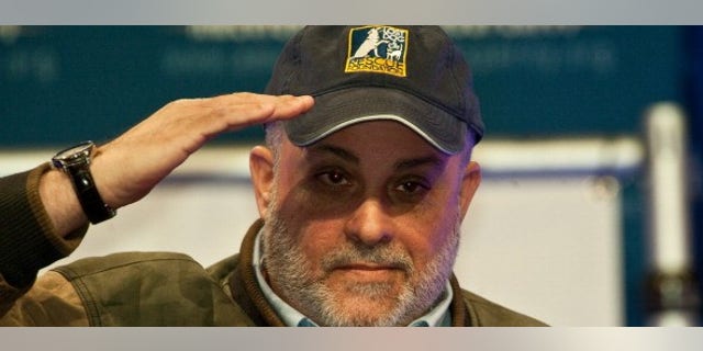Conservative radio host Mark Levin acknowledges the crowd after speaking at a "Cut Spending Now" rally at the conservative Americans for Prosperity "Defending the American Dream Summit" in Washington on Nov. 5, 2011. (NICHOLAS KAMM/AFP/Getty Images)