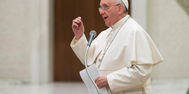 Pope Francis delivers his message on the occasion of an audience granted to members of the Italian Confcooperative, cooperative associations, in the Paul VI hall at the Vatican, Saturday, Feb. 28, 2015. (AP Photo/L'Osservatore Romano, Pool)