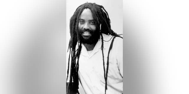 FILE--This undated file photo shows convicted police killer Mumia Abu-Jamal. Goddard College, a liberal arts college in Plainfield, Vt., with 600 students, said on its website Tuesday, Sept. 30, 2014, that Mumia Abu-Jamal's recorded remarks will be played Sunday at a commencement, along with a video about him. (AP Photo/Jennifer E. Beach, File)