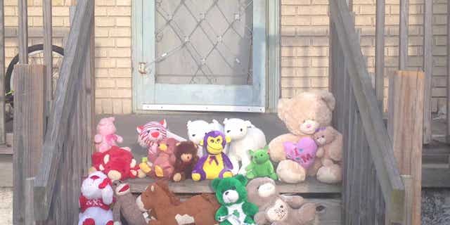 Mourners have turned the site of a quadruple shooting in New Orleans into a makeshift shrine.