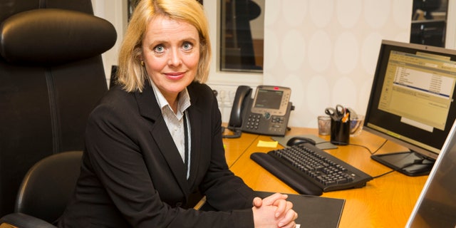 Marie Benedicte Bjoernland, the head of the Norwegian domestic intelligence service PST, poses for a picture in her office in Oslo, Norway Wednesday Oct. 23 2013 during an interview with the Associated Press. PST tried to prevent one of the suspected gunmen in the Nairobi mall attack from joining Somali militants more than three years ago, but failed to talk him out of it, Bjoernland said. The man has been identified in Kenya as Hassan Abdi Dhuhulow, a 23-year-old Somalia native whose family moved to Norway in 1999. (AP Photo/Tor Lindseth)