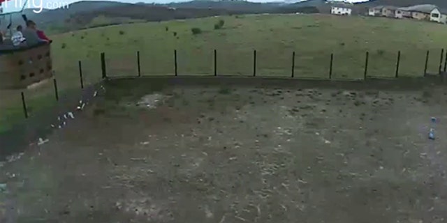 Surveillance video captured the moment the hot air balloon struck a fence while making a crash landing in a San Diego neighborhood.