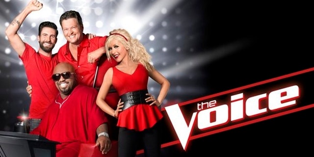 Adam Levine, CeeLo Green, Blake Shelton and Christina Aguilera pose for a promotional photo for "The Voice."