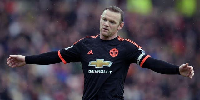 Manchester United's English striker Wayne Rooney reacts during the English Premier League football match between Sunderland and Manchester United at the Stadium of Light in Sunderland, northeast England on February 13, 2016. / AFP / OLI SCARFF / RESTRICTED TO EDITORIAL USE. No use with unauthorized audio, video, data, fixture lists, club/league logos or 'live' services. Online in-match use limited to 75 images, no video emulation. No use in betting, games or single club/league/player publications. / (Photo credit should read OLI SCARFF/AFP/Getty Images)