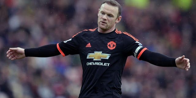 Manchester United's English striker Wayne Rooney reacts during the English Premier League football match between Sunderland and Manchester United at the Stadium of Light in Sunderland, northeast England on February 13, 2016. / AFP / OLI SCARFF / RESTRICTED TO EDITORIAL USE. No use with unauthorized audio, video, data, fixture lists, club/league logos or 'live' services. Online in-match use limited to 75 images, no video emulation. No use in betting, games or single club/league/player publications. / (Photo credit should read OLI SCARFF/AFP/Getty Images)