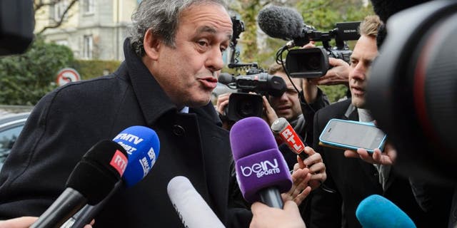 UEFA president and FIFA vice president Michel Platini speaks to the press as he arrives at the Court of Arbitration for Sport (CAS) to appeal against a 90-day suspension in Lausanne on December 8, 2015. The appeal is part of a new campaign by Platini to get back into the election for a new FIFA leader on February 26. / AFP / FABRICE COFFRINI (Photo credit should read FABRICE COFFRINI/AFP/Getty Images)