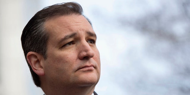 Republican presidential candidate, Sen. Ted Cruz, R-Texas pauses while speaking to the media about events in Brussels, Tuesday, March 22, 2016, near the Capitol in Washington. Cruz said he would use the "full force and fury" of the U.S. military to defeat the Islamic State group.  (AP Photo/Jacquelyn Martin)