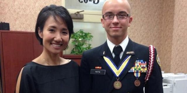 Artur Samarin, 23, was photographed with Rep. Patty Kim after he was inducted into the National Honor Society