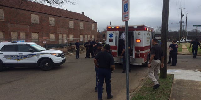 A woman pulled a gun inside an ambulance before stealing the vehicle, authorities said.