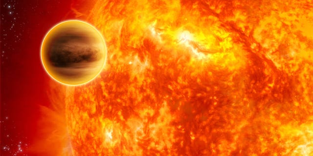 An artist's depiction of a so-called "hot Jupiter"-type planet orbiting a star of about the same size as our sun.