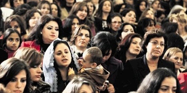 In this AP FILE photo Copts gather to celebrate Christmas in a Cairo Church.