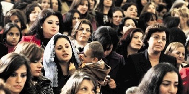 In this AP FILE photo Copts gather to celebrate Christmas in a Cairo Church.
