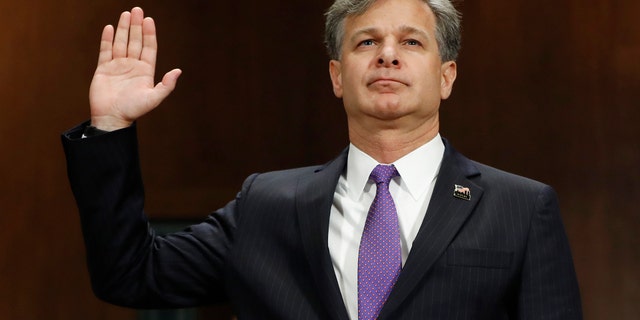 FBI Director nominee Christopher Wray is sworn-in on Capitol Hill in Washington, Wednesday, July 12, 2017, prior to testifying at his confirmation hearing before the Senate Judiciary Committee. (AP Photo/Pablo Martinez Monsivais)