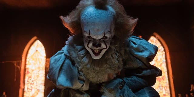Bill Skarsgard stars as Pennywise the clown in "It," a new horror film based on a Stephen King novel.
