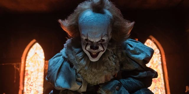 Bill Skarsgard stars as Pennywise the clown in "It," a new horror film based on a Stephen King novel.