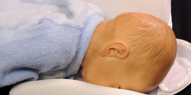Officials warned infant sleep positioners could cause babies to suffocate.