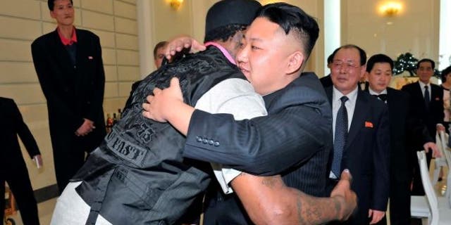 Dennis Rodman embraces Kim Jong Un during a visit to North Korea in 2013. (KCNA via Reuters)