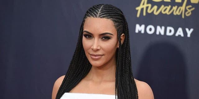 Kardashian explained she wears the braids to match hairstyles when her daughter North asks.