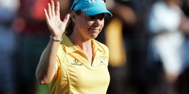 FILE- In this Dec. 14, 2008, file photo, Sweden's Annika Sorenstam waves to supporters following the end of the final round of the Dubai Ladies Masters golf tournament in Dubai, United Arab Emirates. Sorenstam will captain the European Solheim Cup team next year in Des Moines, Iowa, the Ladies European Tour announced, Wednesday, March 30, 2016. (AP Photo/Kamran Jebreili, File)