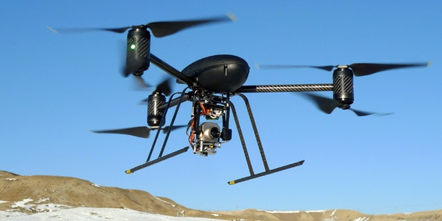 In this Jan. 8, 2009, photo provided by the Mesa County, Colo., Sheriff's Department, a small Draganflyer X6 drone is photographed during a test flight in Mesa County, Colo., with a Forward Looking Infer Red payload.