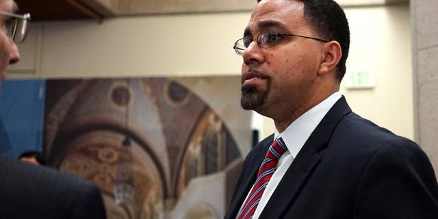U.S. Education Secretary John King meets with students and administrators at the University of California, Los Angeles on Monday, May 9, 2016. The Common Application used for college admissions at more than 600 institutions is changing a question is asks about student criminal records, as the U.S. Department of Education urges schools to consider dropping the question altogether. King called it "an important step forward." (AP Photo/Christine Armario)