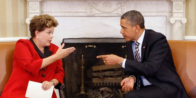 U.S. President Barack Obama and Brazilian President Dilma Rousseff meet in the Oval Office on April 9, 2012.