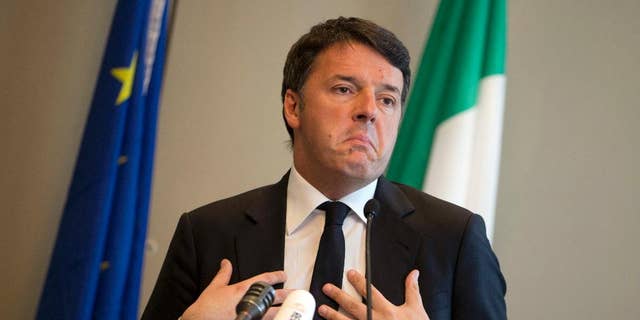 Former Italian Prime Minister Matteo Renzi speaks prior to a conference in Brussels on Friday, April 28, 2017. Renzi is finishing his campaign for the leadership of the Italian Democratic Party in the shadows of the European Union headquarters. (AP Photo/Virginia Mayo)